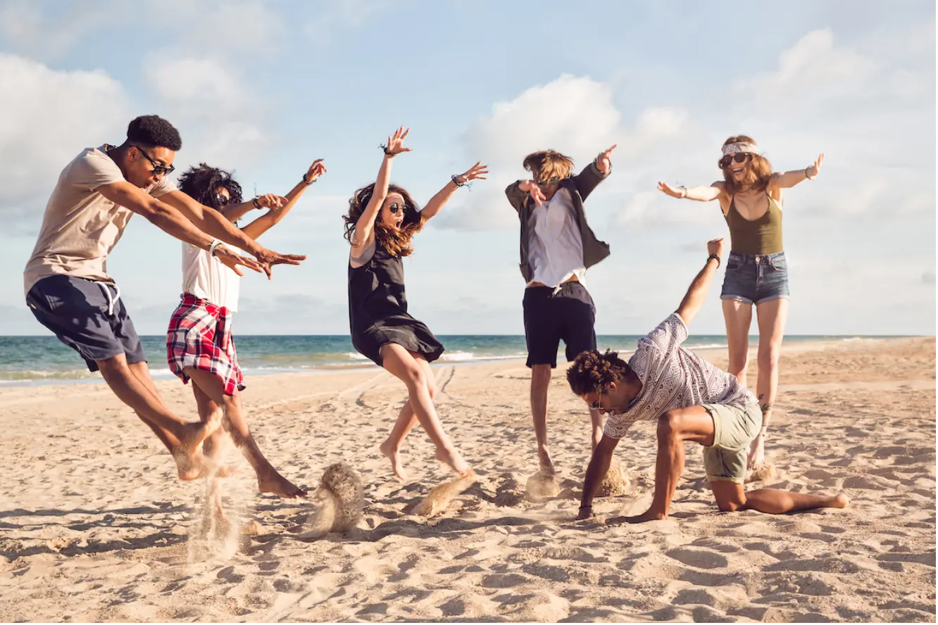 Browse By Activity 1 Treasure Hunt style team activities with team on the beach